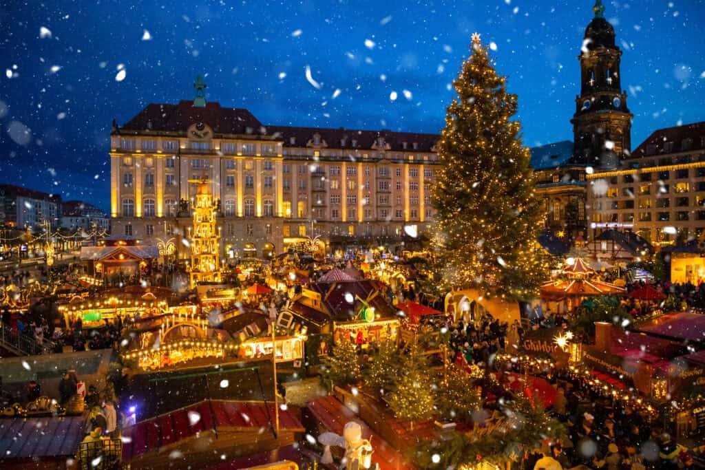 People visit Christmas Market Striezelmarkt in Dresden in Germany