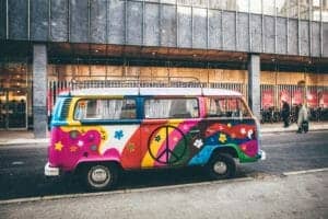 VW campervan with a painted peace symbol