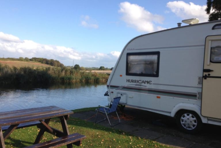 Caravan by the river - owning a caravan