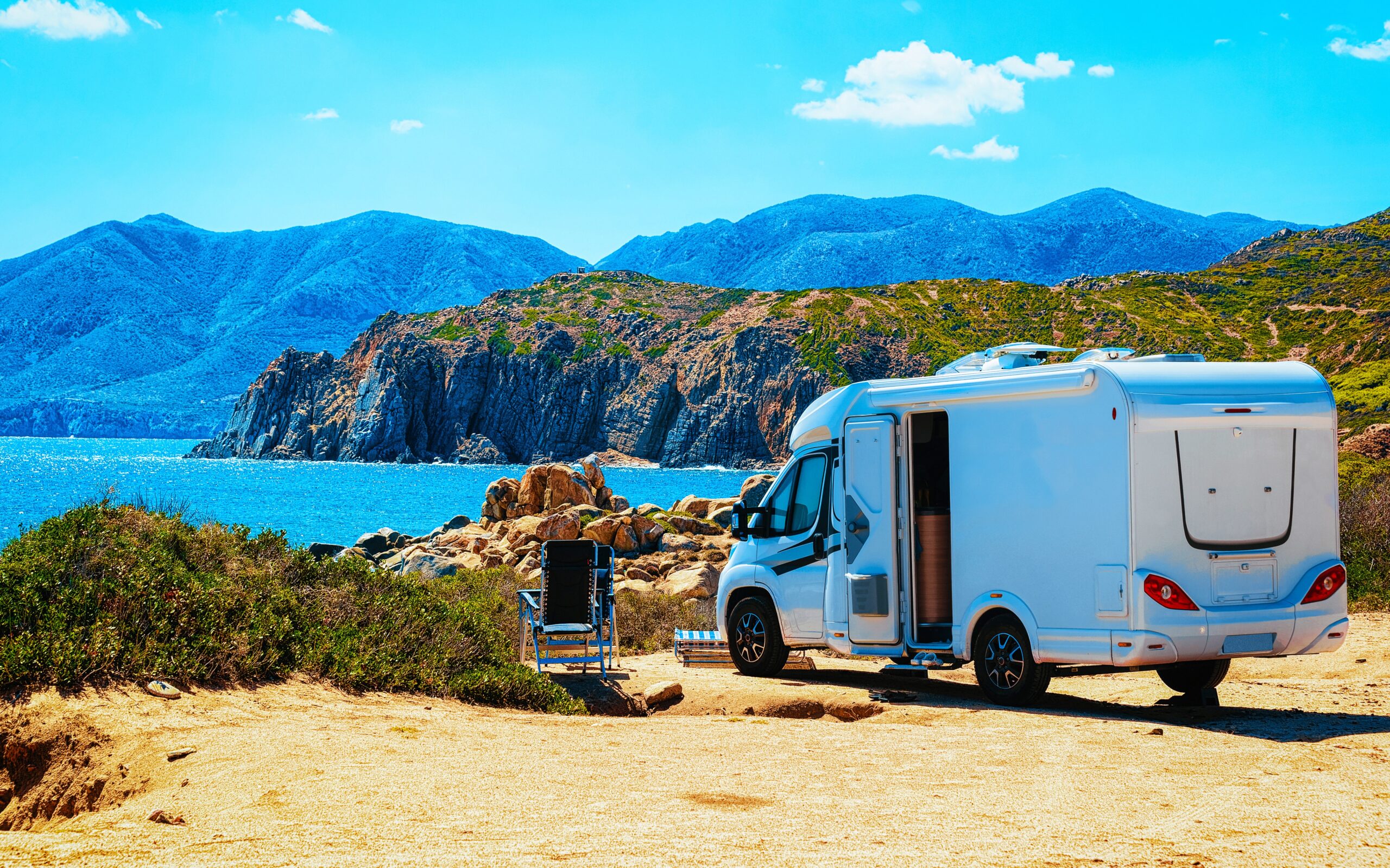 Trailer in Capo Pecora resort at Mediterranean sea Sardinia reflex