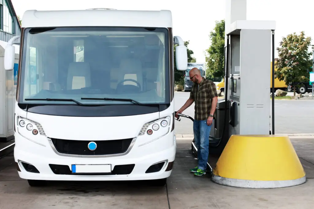 Man fuelling his motorhome.